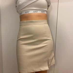 Beige leather mini skirt